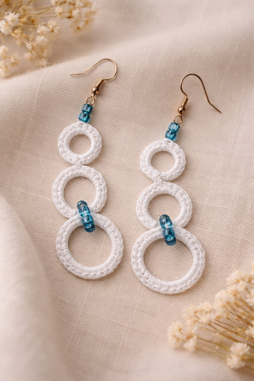Crochet White earrings with teal beads